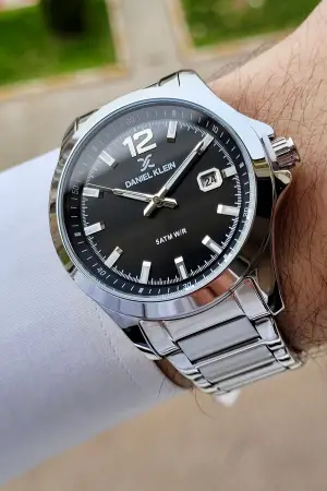 Daniel Klein DKISTE1056 Kadranı Siyah Kordonu Gümüş Renk Hediye Paketli İç Göstergeleri Aktif Erkek Kol Saati