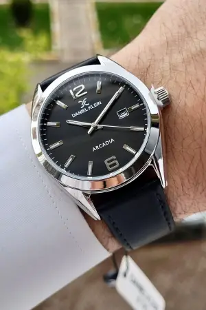 Daniel Klein DKISTE1173 Kasası Gümüş Kordonu ve Kadranı Siyah Renk Hediye Paketli Takvimli Erkek Kol Saati