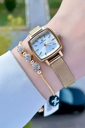 Daniel Klein DKISTE1220 Kadranı Gümüş Kordonu Gold Renk Hediye Paketli Kadın Kol Saati ve Bileklik