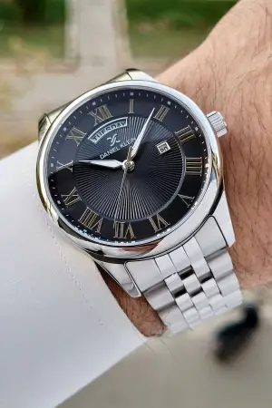 Daniel Klein DKISTE1287 Kadranı Siyah Kordonu Gümüş Renk Takvim ve Gün Fonksiyonlu Hediye Paketli Erkek Kol Saati