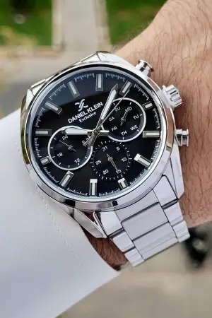 Daniel Klein DKISTE1395 Kadranı Siyah Kordonu Gümüş Renk Hediye Paketli Takvimli Erkek Kol Saati