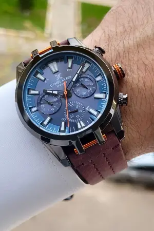 Daniel Klein DKISTE1385 Kasası Füme Kordonu Kahverengi Renk Hediye Paketli Göstergeleri Aktif Erkek Kol Saati