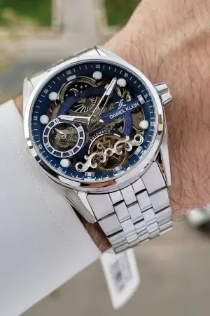 Daniel Klein DKISTE1421 Kadranı Lacivert Kordonu Gümüş Renk Otomatik Fonksiyonlu Fosforlu Erkek Kol Saati