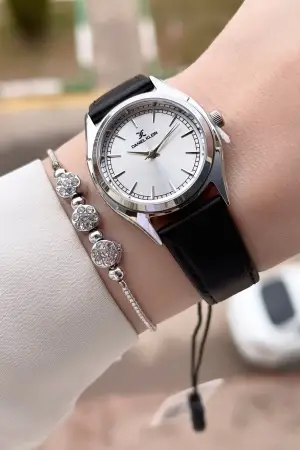 Daniel Klein DKISTE1554 Kasası Gümüş Kordonu Siyah Renk Kadın Kol Saati ve Bileklik