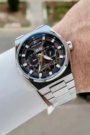 Kadranı Kahverengi Siyah Kordonu Gümüş Renk Göstergeleri Aktif Otomatik Erkek Kol Saati