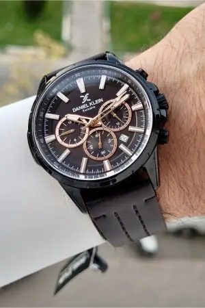 Kasası Siyah Kordonu Kahverengi Renk İç Göstergeleri Aktif Erkek Kol Saati