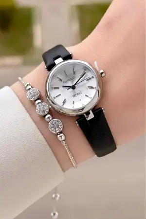 Kasası Gümüş Kordonu Siyah Renk 25 Mm Kadın Kol Saati ve Hediye Bileklik