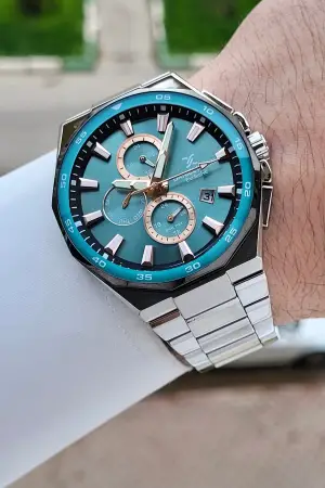 Kadranı Turkuaz Kordonu Gümüş Renk 43,5 Mm Erkek Kol Saati