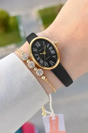 Kasası Gold Kordonu Siyah Renk Hediye Paketli 22 Mm 5 ATM Kadın Kol Saati