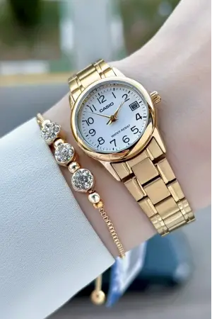 Casio CSISTE213 Casio Gold Renk Takvimli Hediye Paketli Kadın Kol Saati