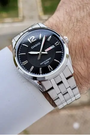 Casio CSISTE195 Kadranı Siyah Kordonu Metalik Renk 2 Yıl Garantili Erkek Kol Saati