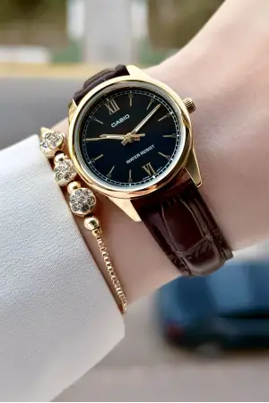 Casio CSISTE219 Casio Kasası Gold Kordonu Kahverengi Renk Hediye Paketli Kadın Kol Saati