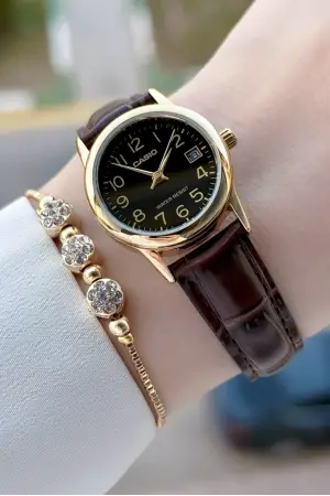 Casio CSISTE214 Casio Kasası Gold Kordonu Kahverengi Renk Takvimli Hediye Paketli Kadın Kol Saati