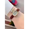 Kasası Gold Kordonu Kahverengi Renk Hediye Paketli 20 Mm 5 ATM Kadın Kol Saati