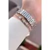 Kadranı Pembe Kordonu Gümüş Renk 28 Mm Hediye Paketli Kadın Kol Saati
