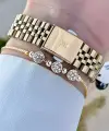 Daniel Klein DKISTE1252 Gold Renk Hediye Paketli Kadın Kol Saati ve Bileklik