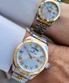 Daniel Klein DKISTE1401 Gold Gümüş Renk Takvim ve Gün Fonksiyonlu Hediye Paketli Sevgili Çift Kol Saati
