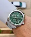 Kadranı Yeşil Kordonu Gümüş Renk Iç Göstergeleri Aktif Erkek Kol Saati