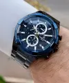 Rakamları Gümüş Kadranı Lacivert Kordonu Siyah Renk İç Göstergeleri Aktif Erkek Kol Saati