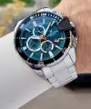 Kadranı Petrol Mavisi Kordonu Gümüş Renk 47 Mm İç Göstergeleri Aktif Erkek Kol Saati