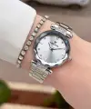 Gümüş Renk Kesme Camlı Kadın Kol Saati Ve Bileklik