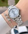 Kadranı Mavi Kordonu Gümüş Renk 30 Mm Hediye Paketli Kadın Kol Saati