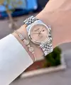 Kadranı Pembe Kordonu Gümüş Renk 28 Mm Hediye Paketli Kadın Kol Saati