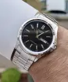 Casio CSISTE94 Kadranı Siyah Kordonu Gümüş Renk Gün ve Takvim Fonksiyonlu Hediye Paketli Erkek Kol Saati