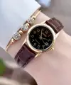 Casio CSISTE214 Casio Kasası Gold Kordonu Kahverengi Renk Takvimli Hediye Paketli Kadın Kol Saati