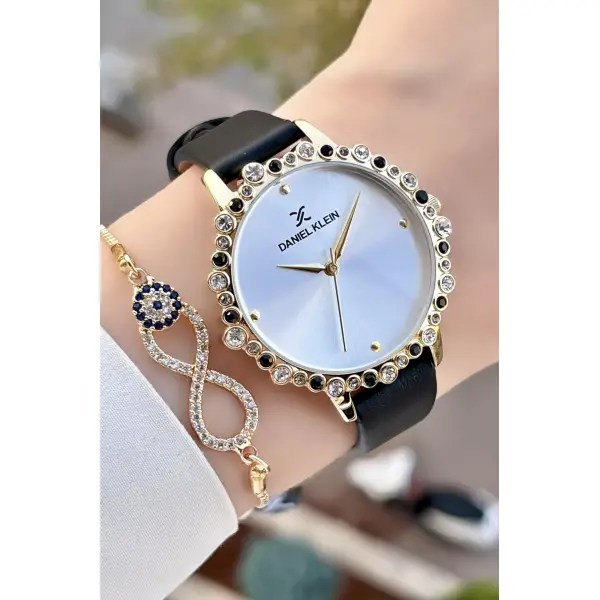 Daniel Klein DKISTE760 Kasası Gold Kordonu Siyah Renk Deri Kordon Kadın Kol Saati Ve Bileklik