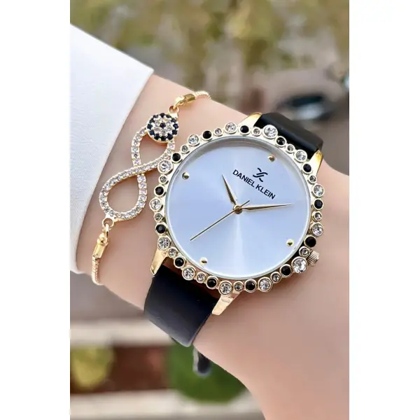 Daniel Klein DKISTE760 Kasası Gold Kordonu Siyah Renk Deri Kordon Kadın Kol Saati Ve Bileklik