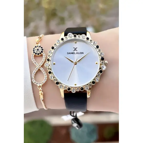 Daniel Klein DKISTE760 Kasası Gold Kordonu Siyah Renk Deri Kordon Kadın Kol Saati Ve Bileklik