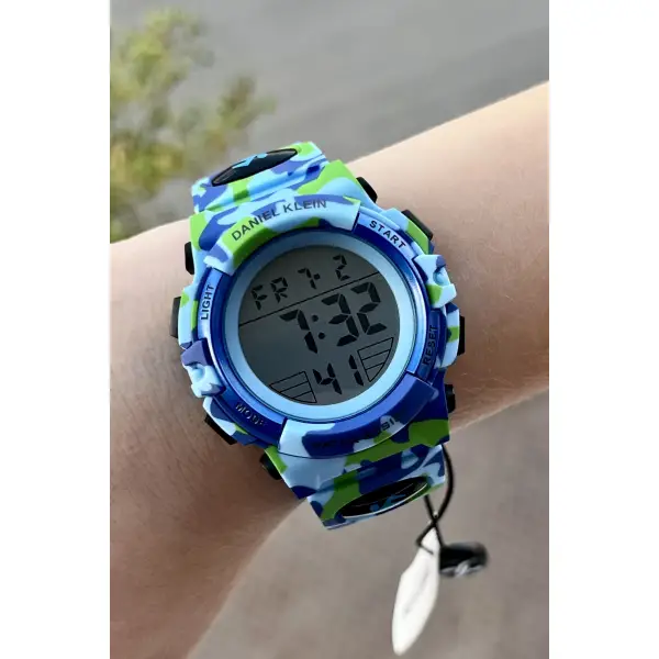 Daniel Klein DKISTE767 Açık Mavi Renk 7 Farklı Işıklı 5 ATM Çocuk Kol Saati