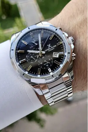 Daniel Klein DKISTE194 Kadranı Siyah Kordonu Gümüş Renk İç Göstergeleri Aktif Fonksiyonlu Erkek Kol Saati