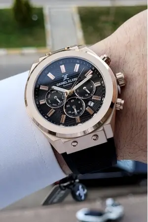 Daniel Klein DKISTE256 iç Göstergeleri Aktif Fonksiyonlu 2 Yıl Garantili Kasası Rose Kordonu Siyah Renk Erkek Kol Saati