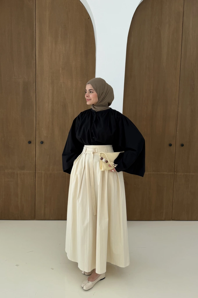 1287 PİLELİ KMR ETEK KOYU KREM