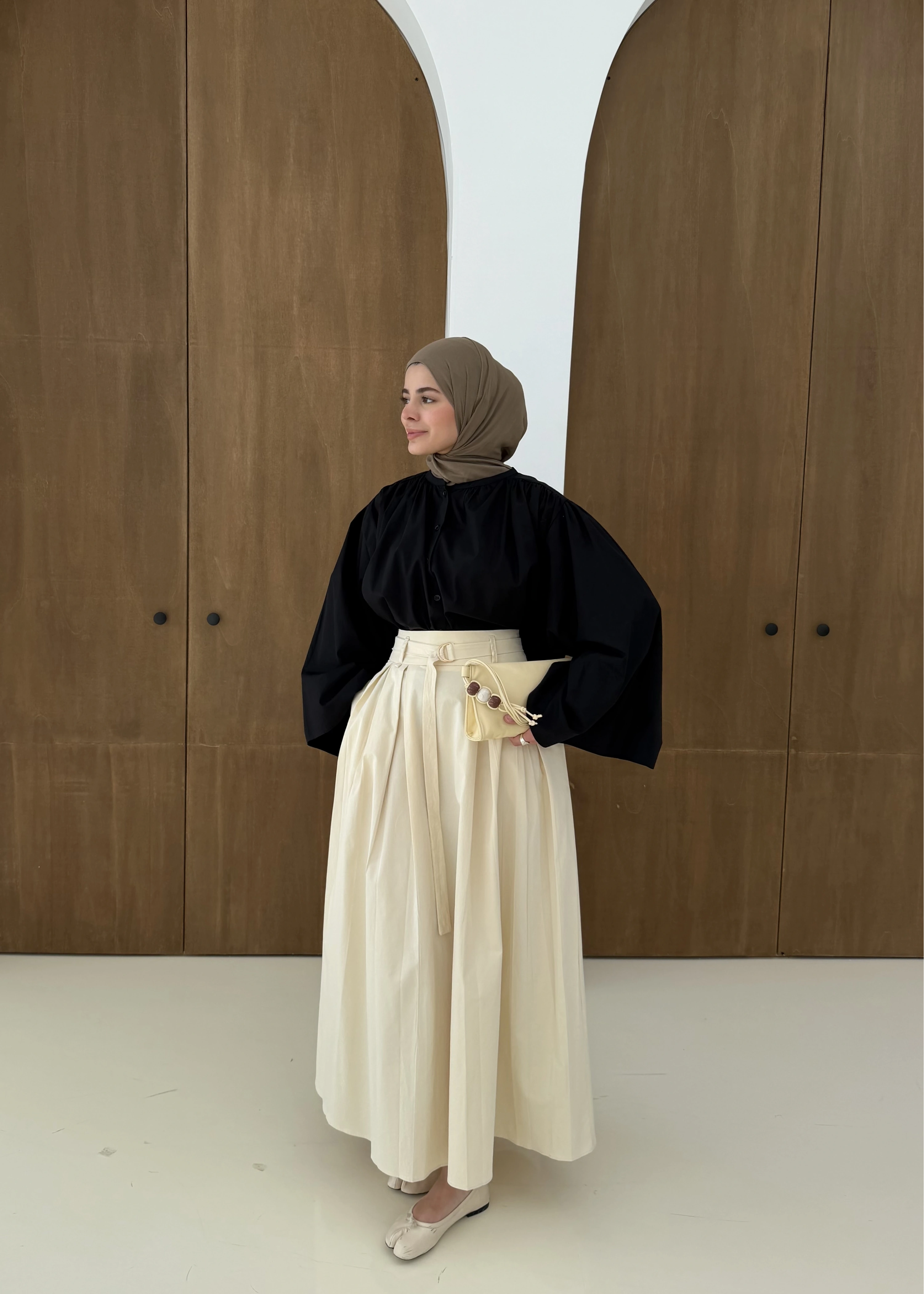 1287 PİLELİ KMR ETEK KOYU KREM