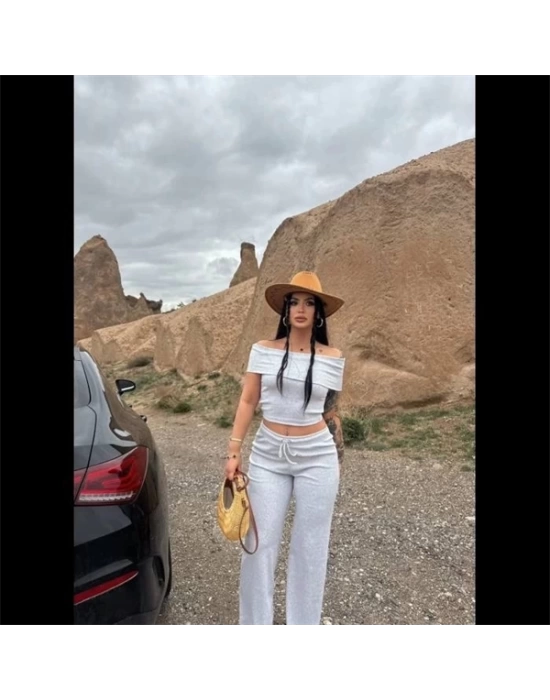 Madonna yaka bol paça pantolonlu takım